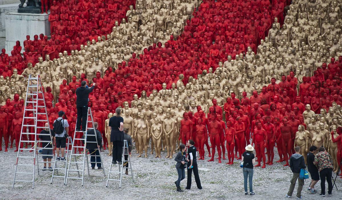 Photographer Spencer Tunick (3rd from left)