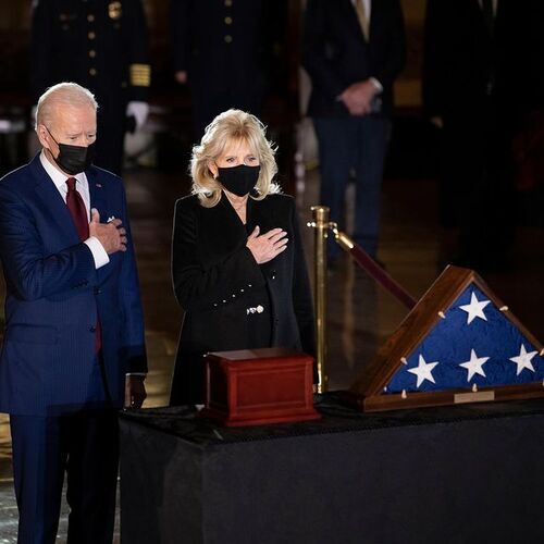 President Joe Biden and first lady Jill Biden pay their respect
